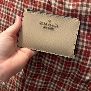 Used Kate Spade card holder with zipper part